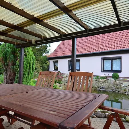 In The Harz With A Log Cabin Pond And Covered Seating Area
